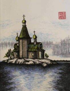 20161012 wooden chapel on a rock in a misty lake